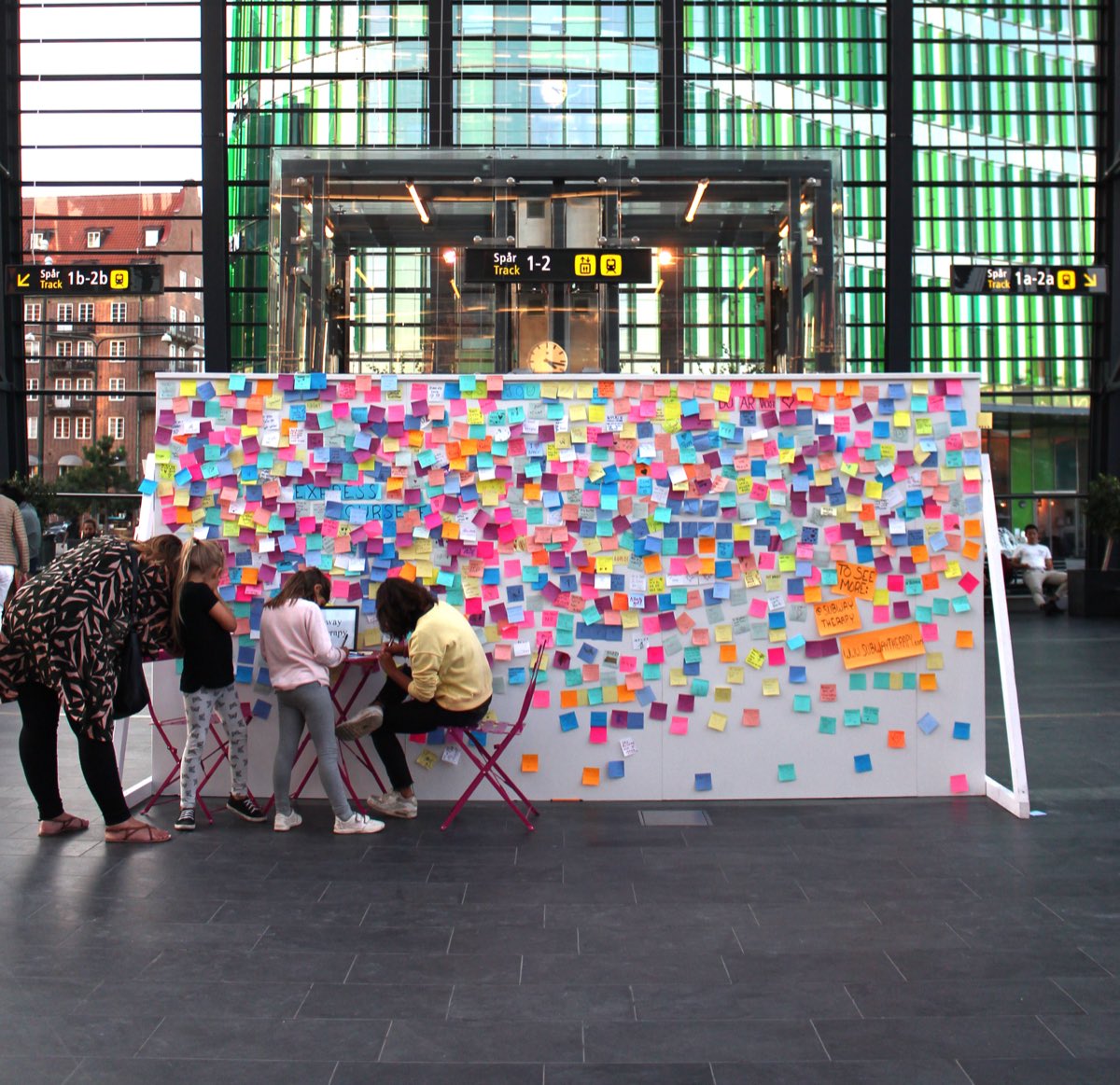 Subway Therapy — sticky notes and conversations in public space